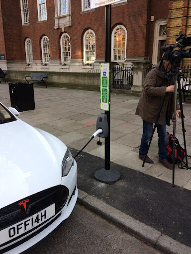 Gecko charger charging a Tesla car on the street